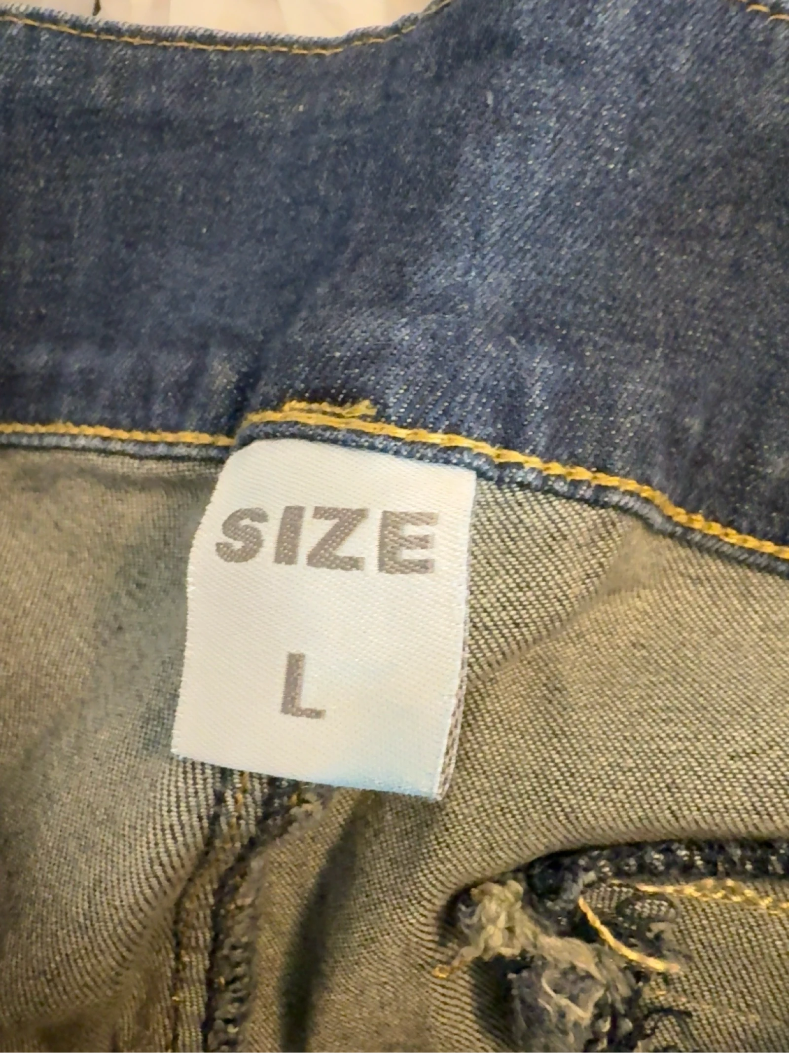 Blue washed effect jeans with side pleats – photo 7